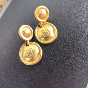 Vintage Givenchy gold-plated drop earrings featuring the 4G logo.